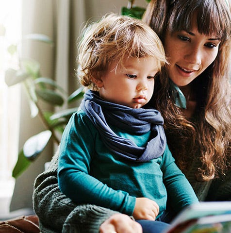 A mother reading to her child